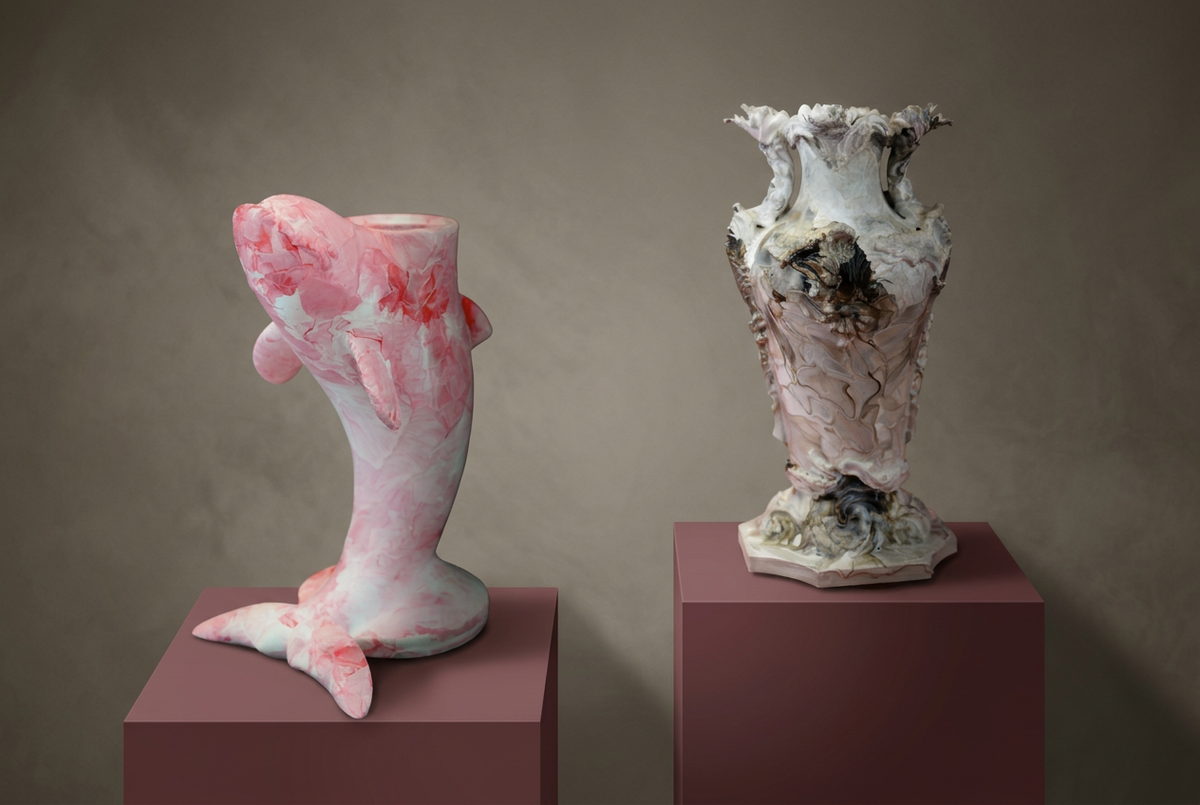 Pink-white Hokra Tuxo and white-dark brown Xarth Rolve displayed on burgundy gallery plinths