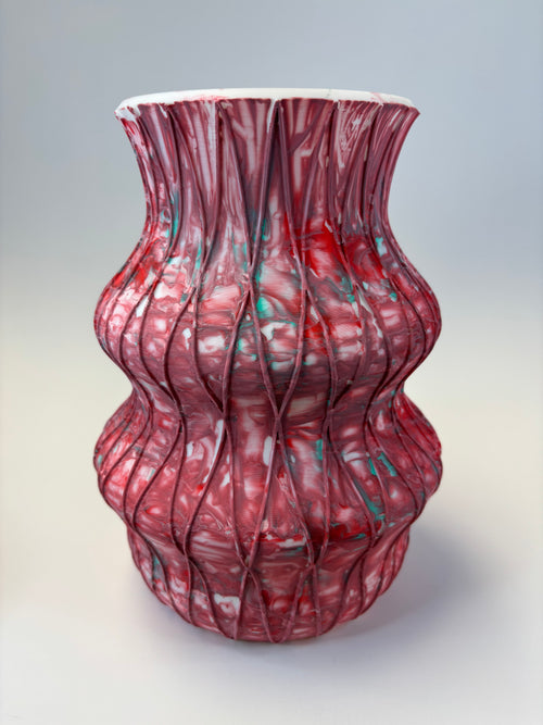 Fancy vase with red and white design