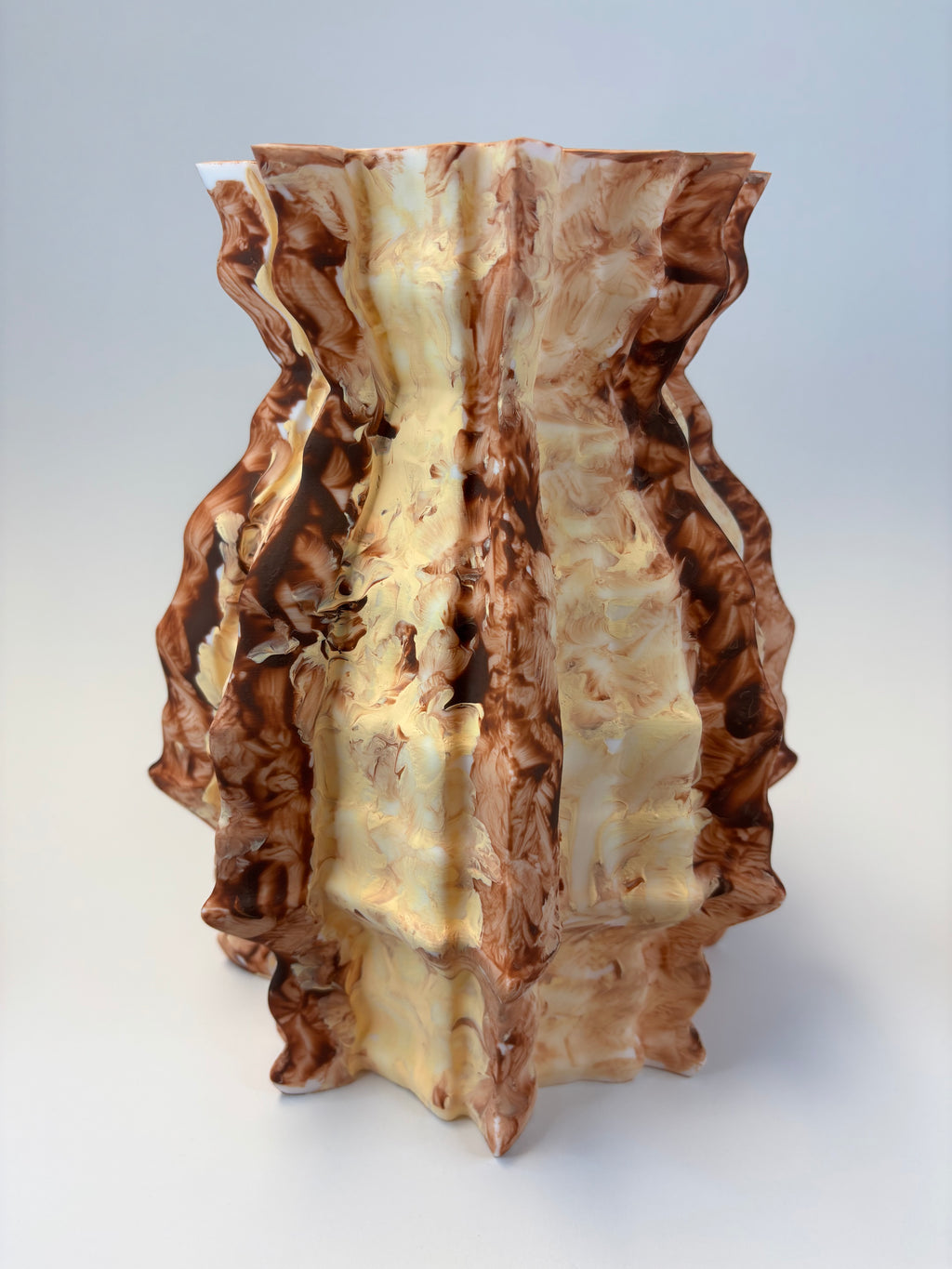 Decorative vase piece with wavy, layered design 