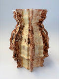 Decorative vase piece with wavy, layered design 