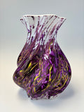 Decorative vase piece with purple and gold swirls