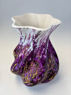 Decorative vase piece with purple and gold swirls
