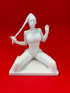 White figurine on a red background
