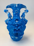 Blue vase with decorative design