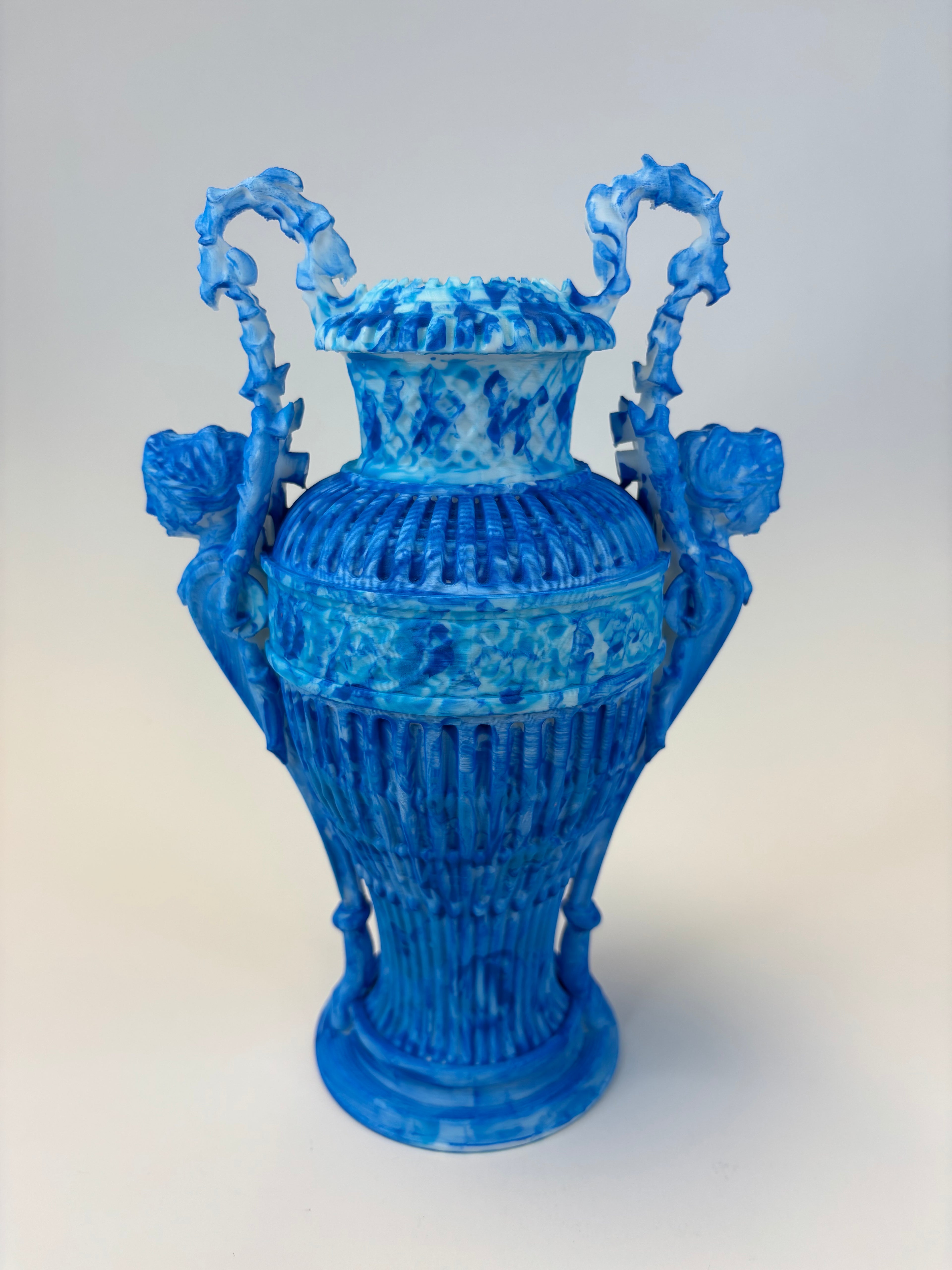 Blue decorative vase with intricate design