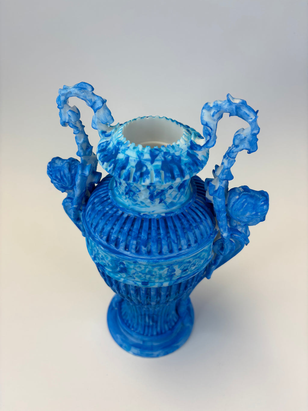 Blue decorative vase with intricate design