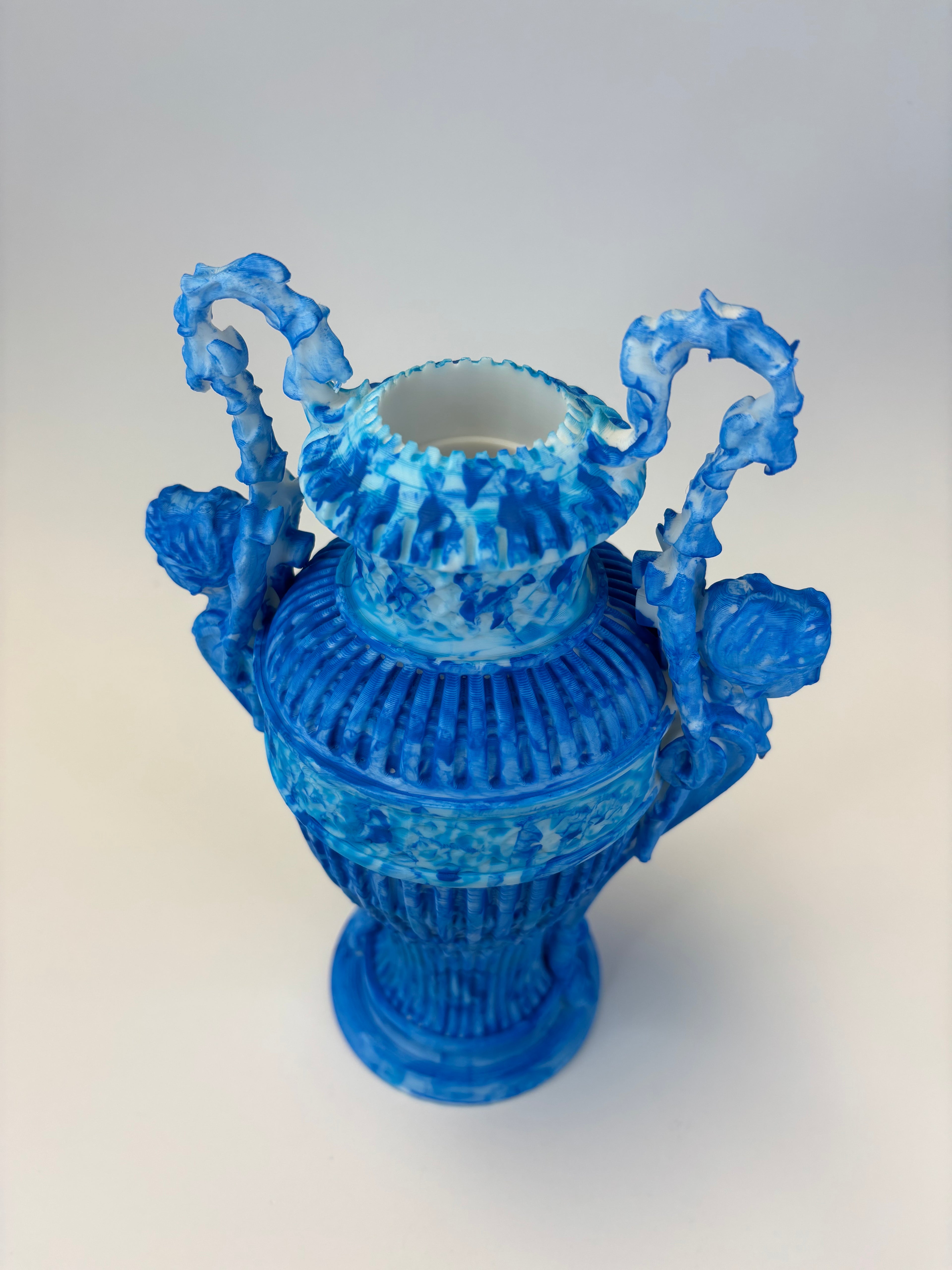 Blue decorative vase with intricate design
