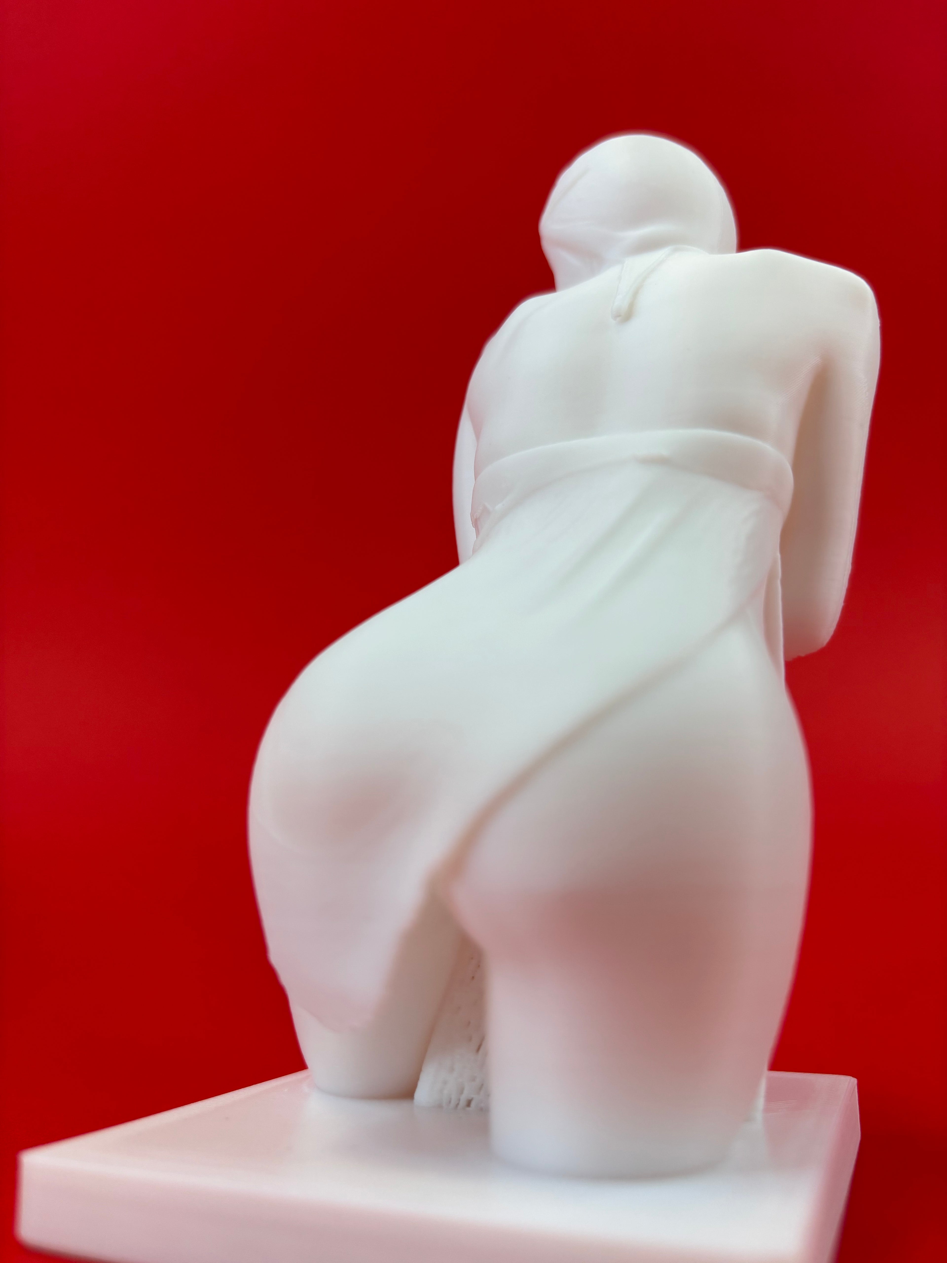 White figure on a red background