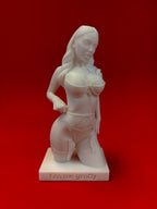 White figurine of a woman on a red background