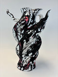 Black and white abstract art on a light gray background