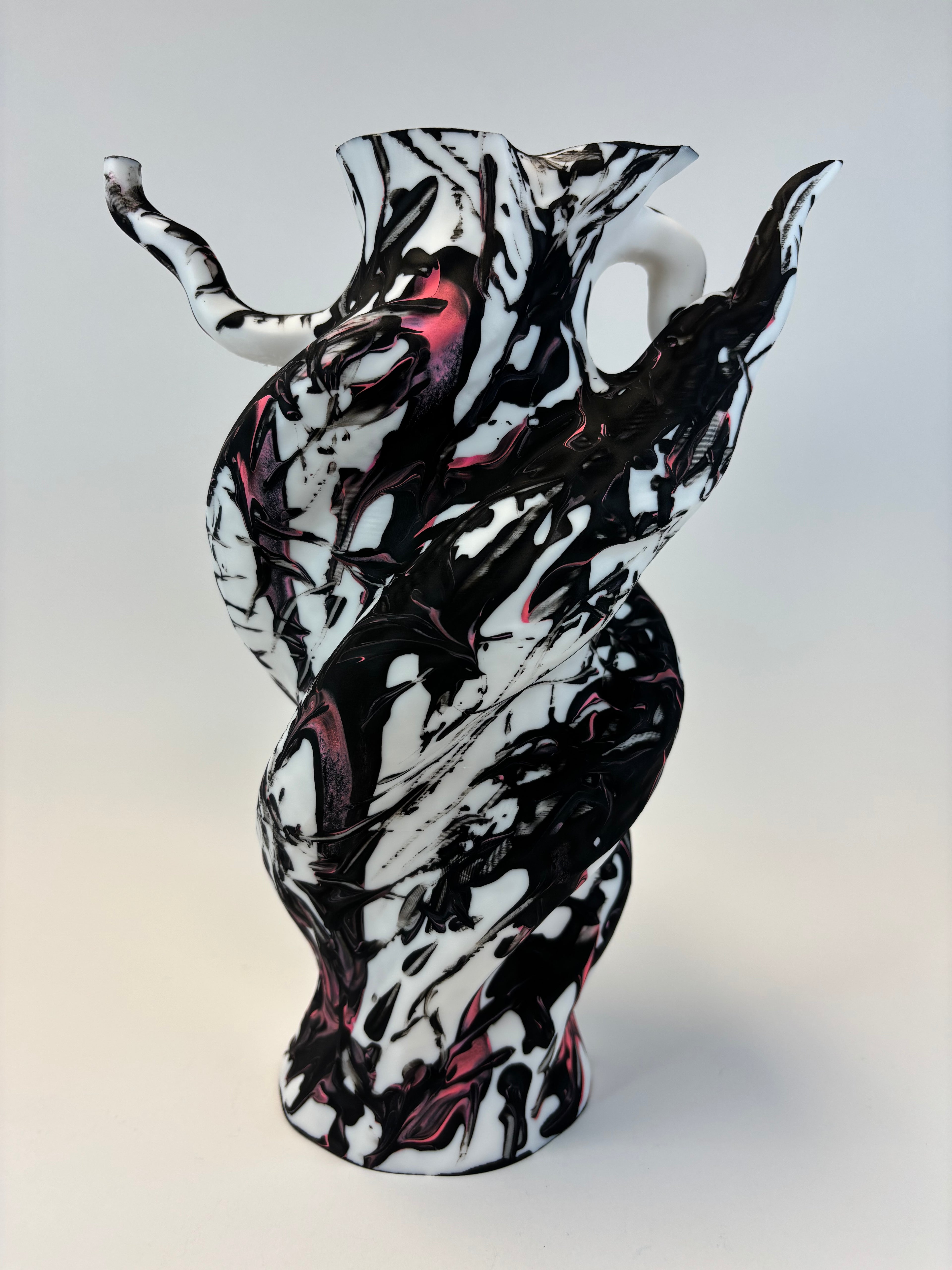 Black and white abstract art on a light gray background