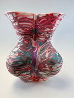 Marbled ceramic vase with multicolor design on a white background