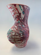 Marbled ceramic vase on a white background