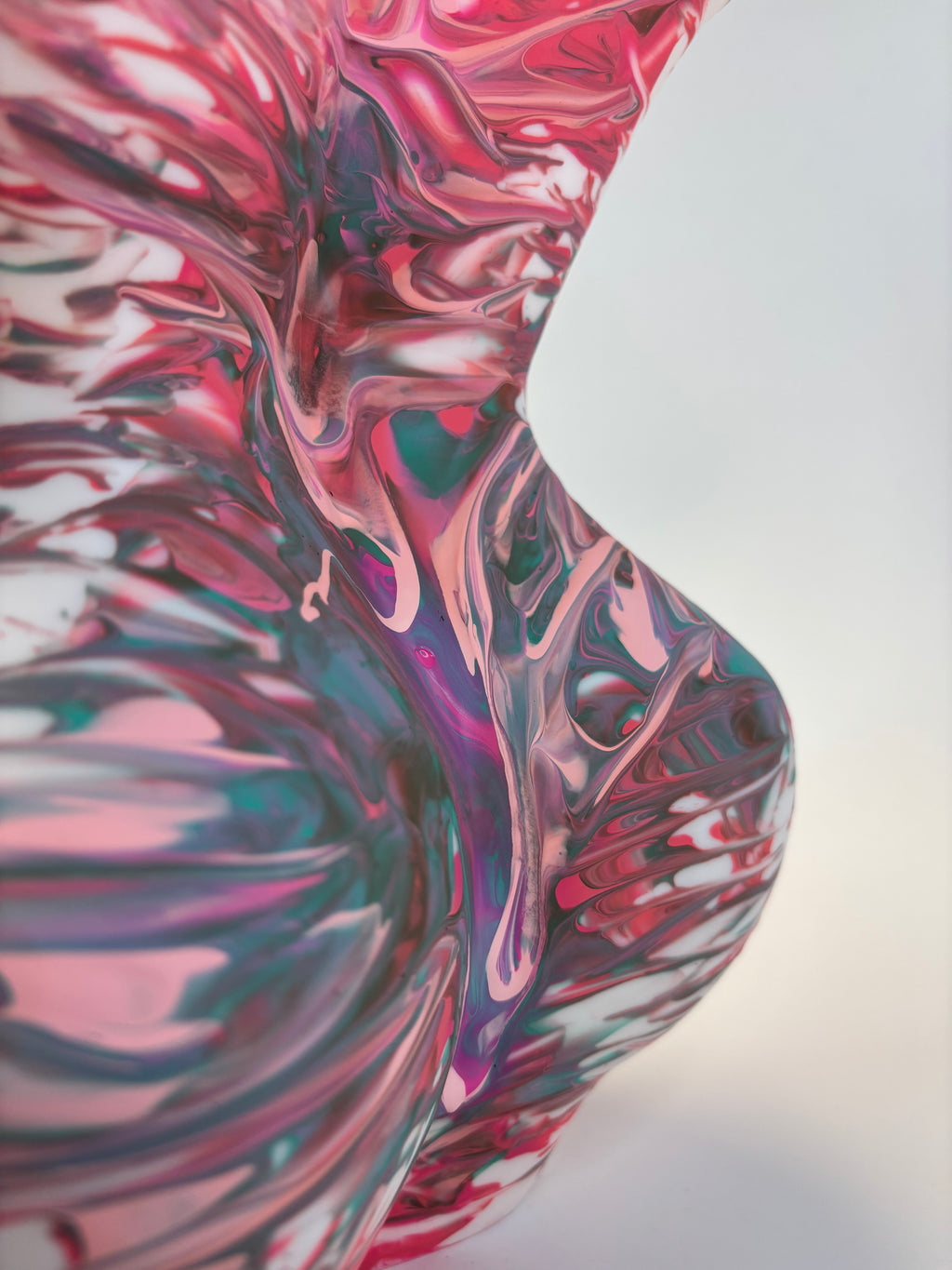 Colorful abstract pattern vase on a white background