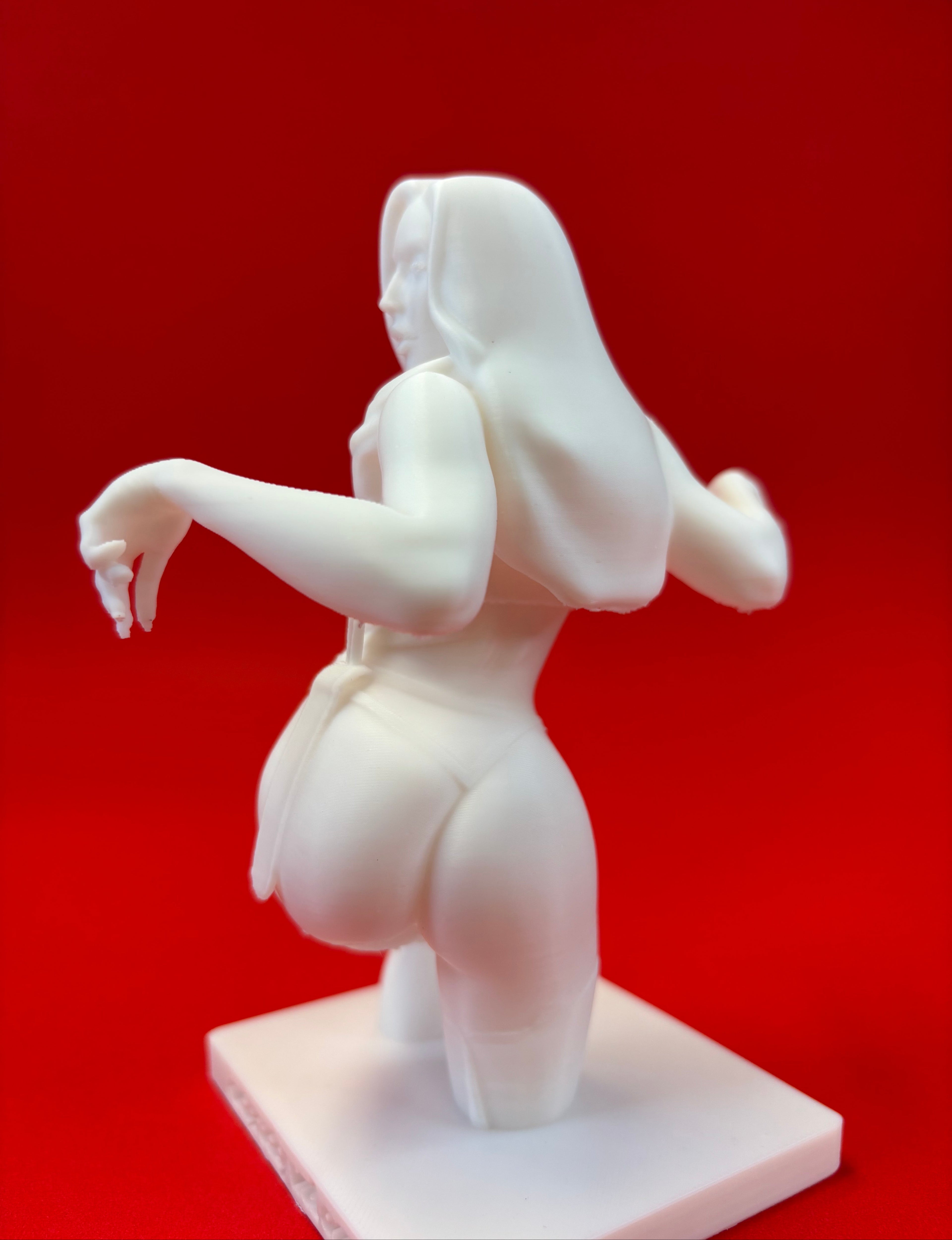 White statue of a woman on a red background