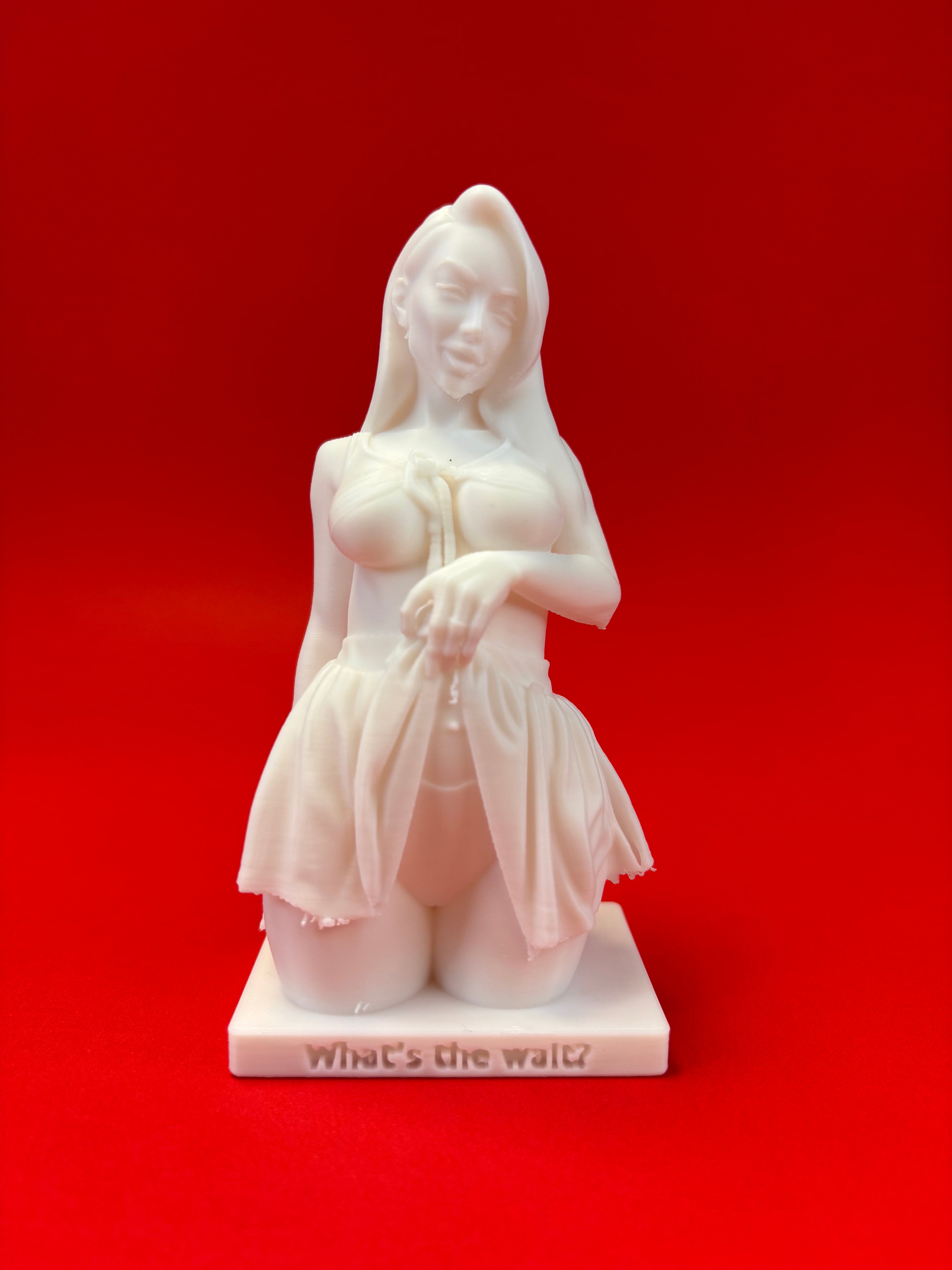 Statue of a draped figure on a red background
